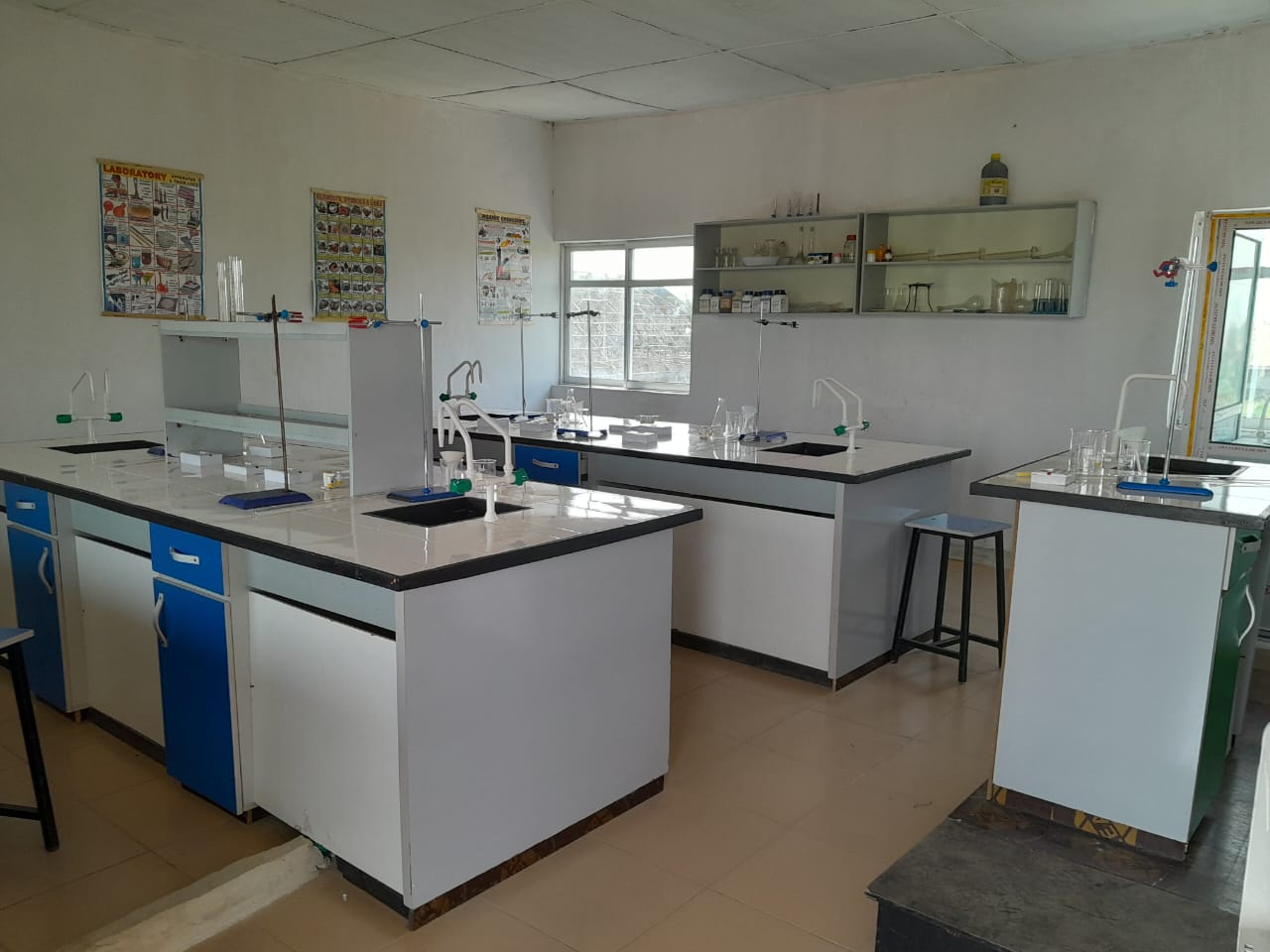 Students learning in the physics laboratory at Divine Alpha Schools